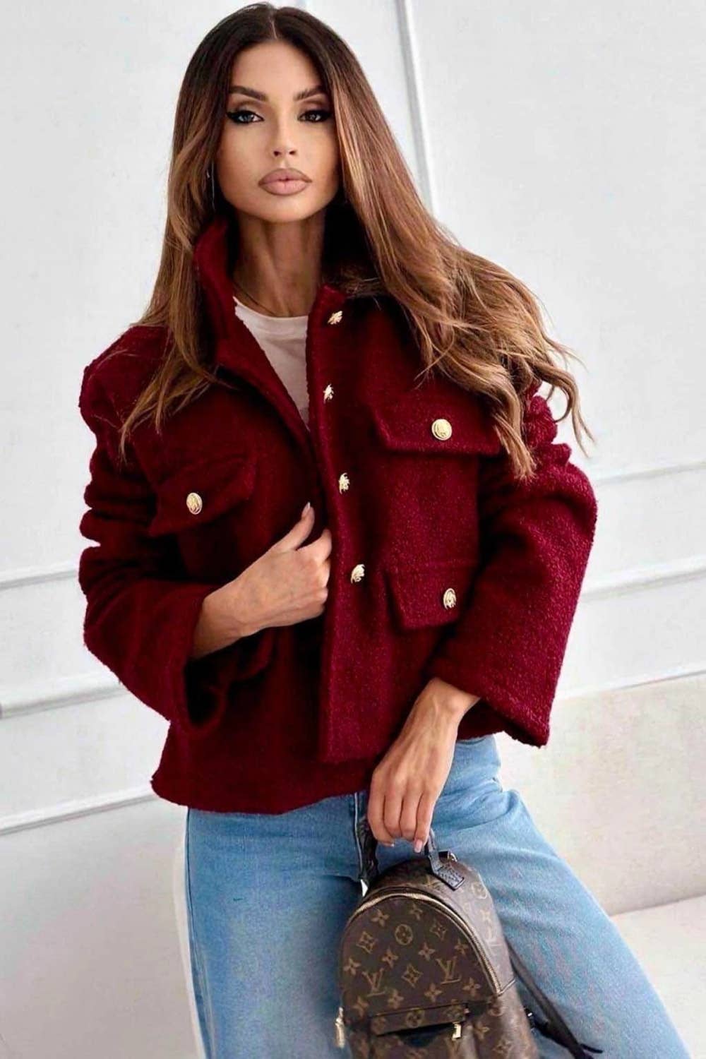 Teddyjacke mit goldenen Knöpfen