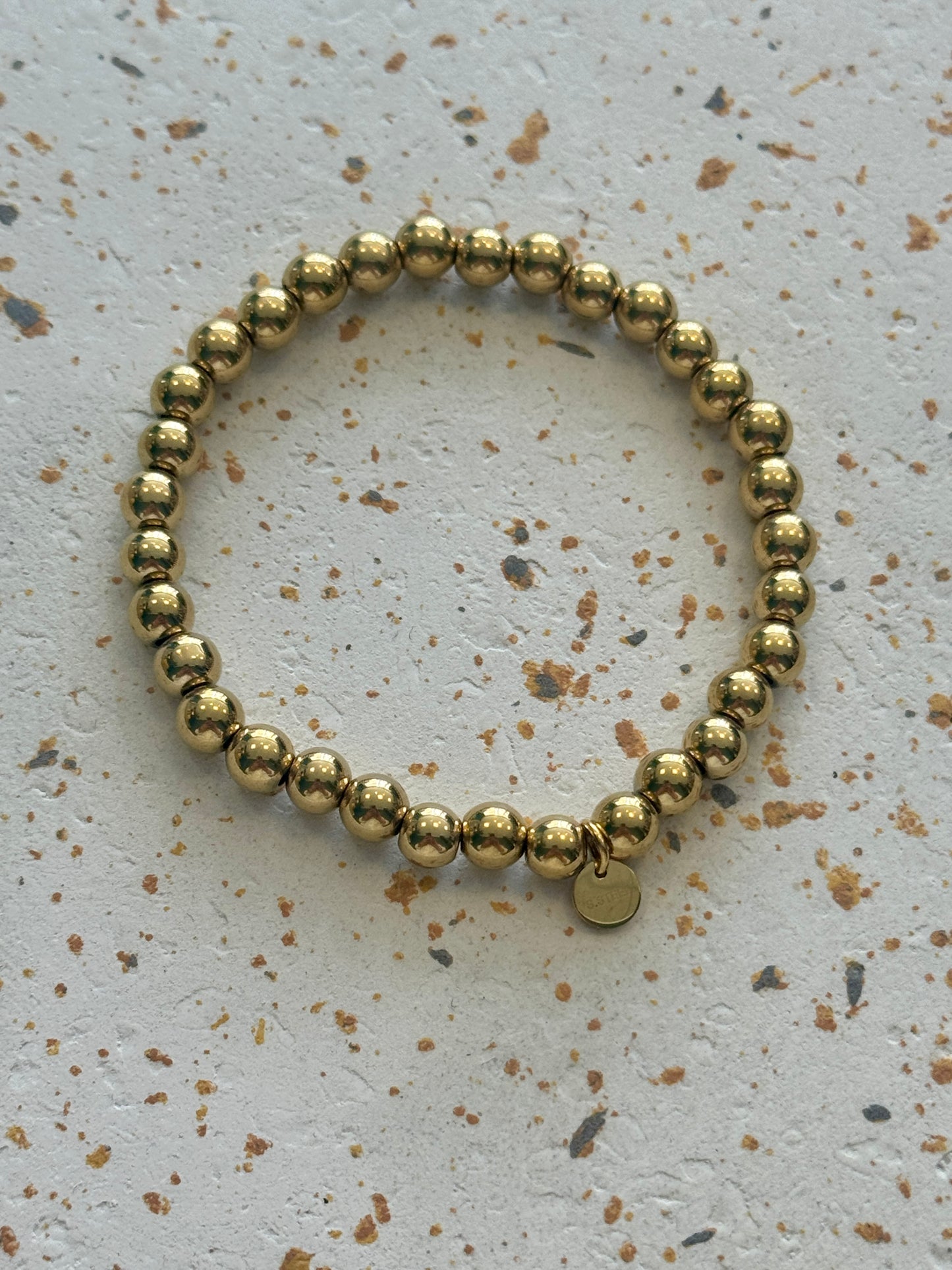 Goldenes Perlenarmband