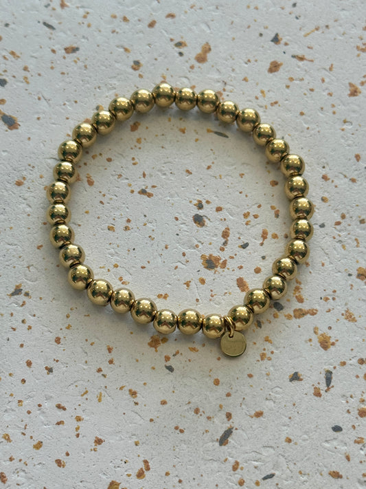 Goldenes Perlenarmband